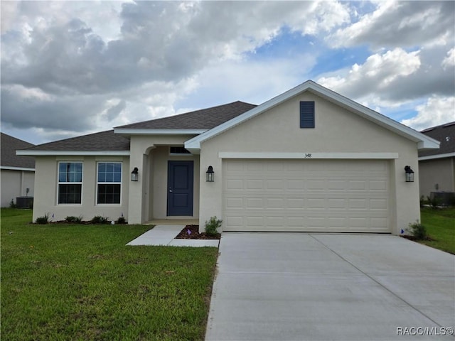 348 W Rexford Dr, Beverly Hills, FL 34465 - ranch-style home with stucco siding, concrete driveway, a garage, a front yard, and a shingled roof