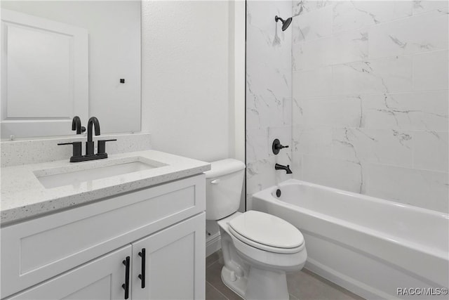 bathroom featuring toilet, tub / shower combination, and vanity