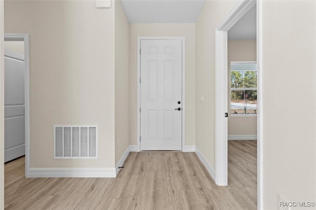 entrance foyer with light wood-type flooring