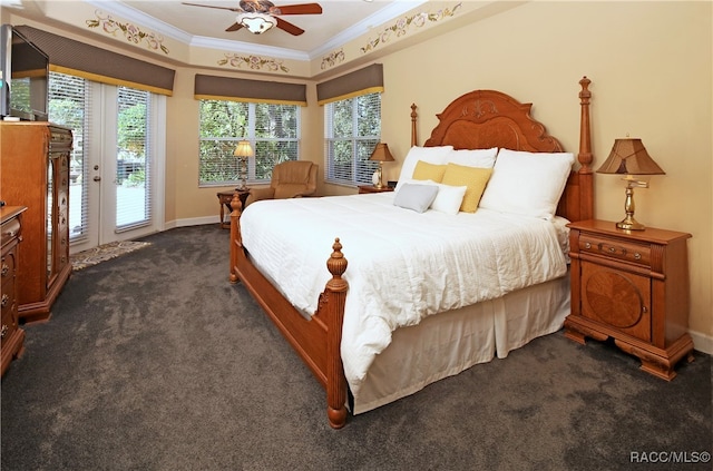 carpeted bedroom with access to exterior, multiple windows, ornamental molding, and ceiling fan