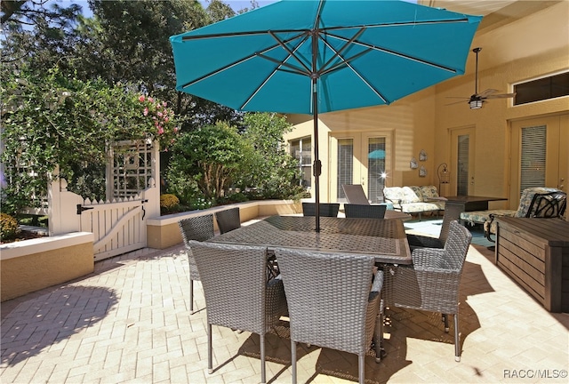 view of patio with an outdoor hangout area and ceiling fan