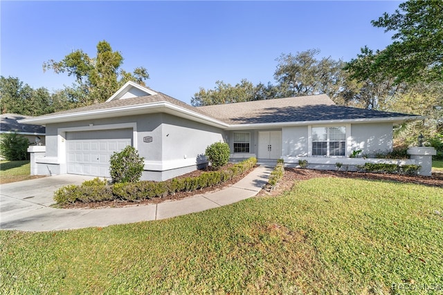 ranch-style house with a front yard and a garage