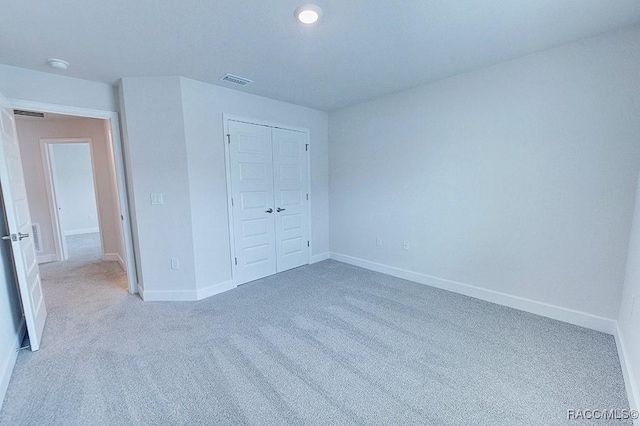 8330 N India Way, Citrus Springs, FL 34434 - unfurnished bedroom with carpet floors, baseboards, and a closet