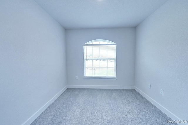 8330 N India Way, Citrus Springs, FL 34434 - empty room with carpet floors and baseboards