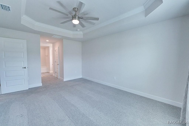 8330 N India Way, Citrus Springs, FL 34434 - carpeted spare room featuring a raised ceiling, ornamental molding, ceiling fan, baseboards, and recessed lighting