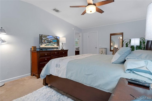 carpeted bedroom featuring ceiling fan and lofted ceiling