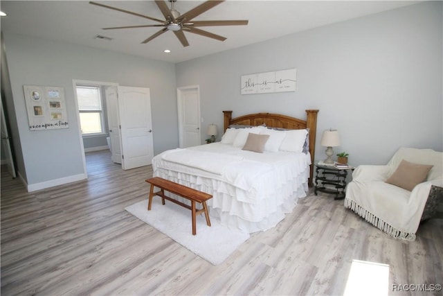 bedroom with visible vents, ceiling fan, baseboards, recessed lighting, and wood finished floors