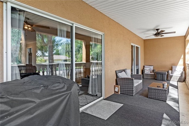 view of patio / terrace featuring ceiling fan and a grill