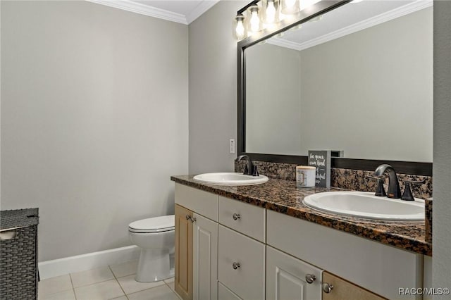 bathroom featuring crown molding, toilet, tile patterned floors, and vanity