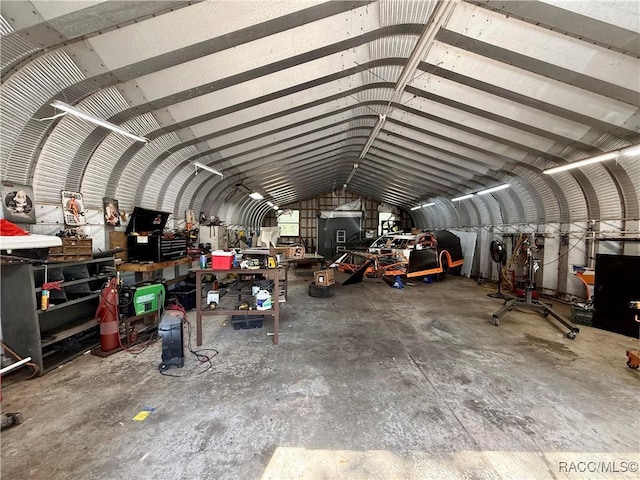 miscellaneous room featuring lofted ceiling