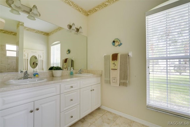 bathroom with vanity and tile patterned floors