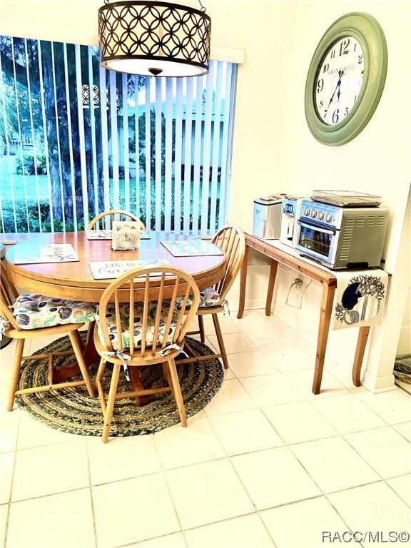 view of tiled dining space