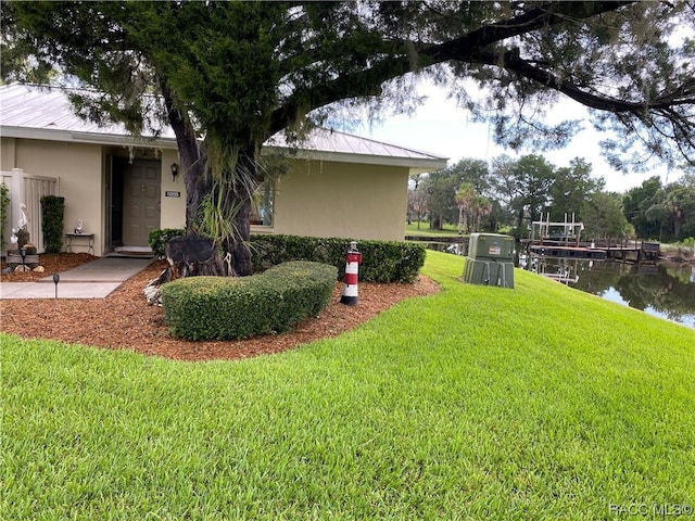 view of yard with a water view