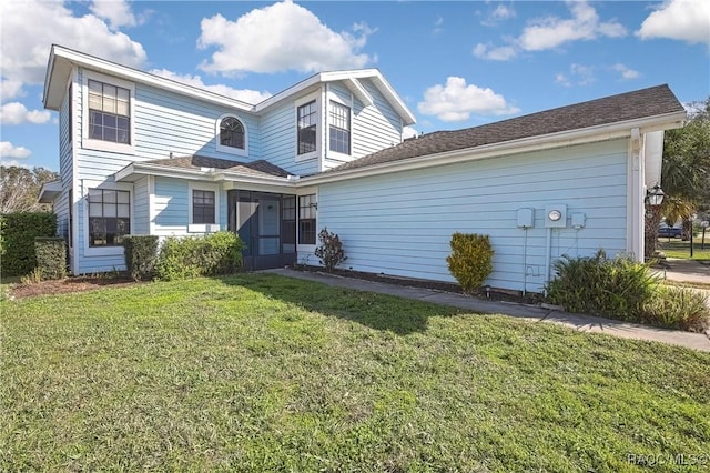 traditional home with a front yard