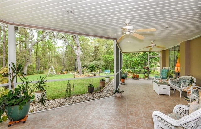 view of patio / terrace featuring ceiling fan