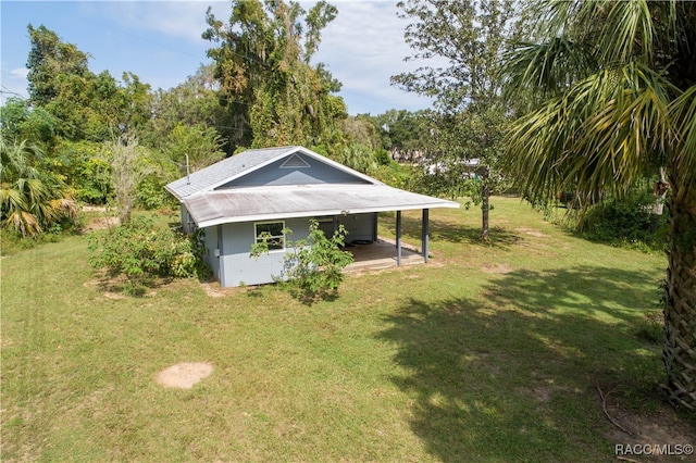 view of property exterior with a yard