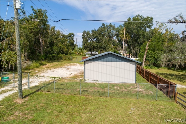 garage with a yard