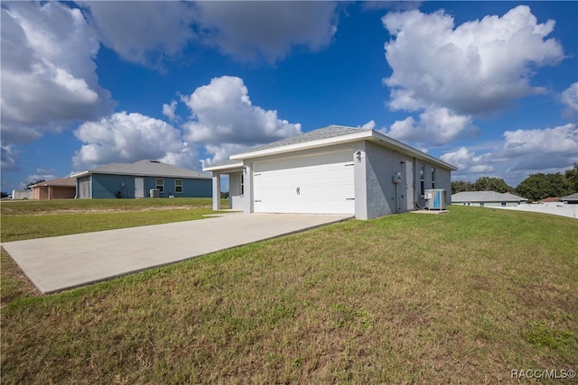 single story home with a front yard, central AC, and a garage