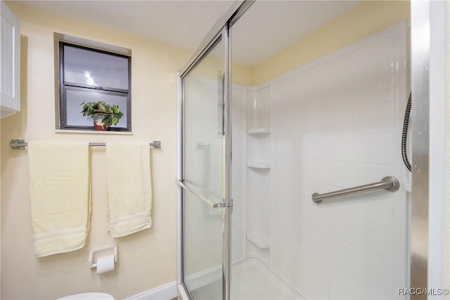 bathroom with a stall shower