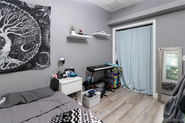 bedroom featuring light hardwood / wood-style floors