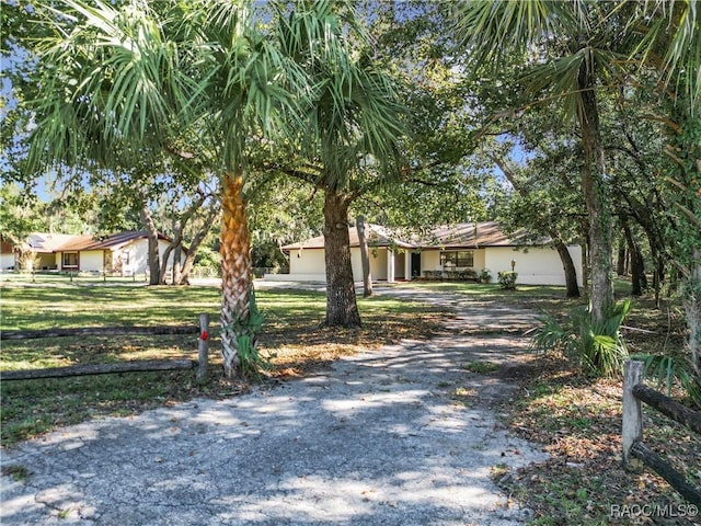 ranch-style home with a garage