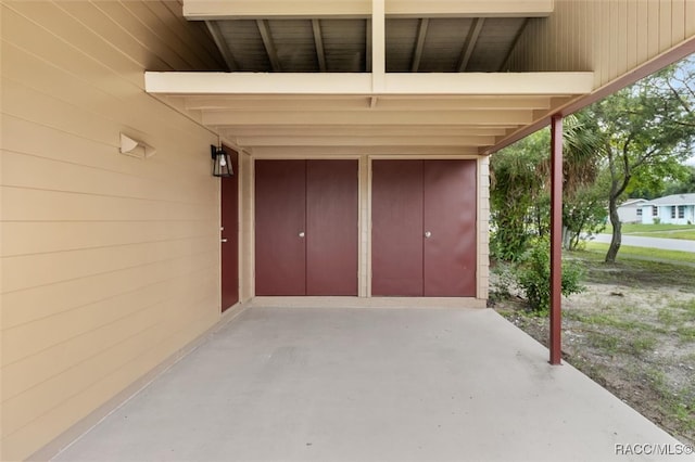 garage with a carport