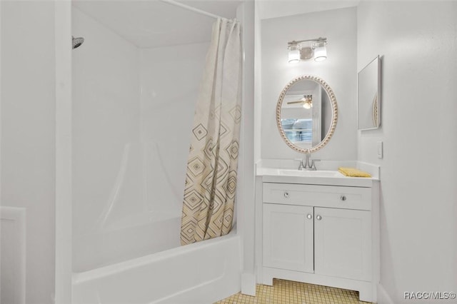 bathroom featuring vanity and shower / tub combo