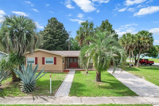 view of front of home with a front lawn