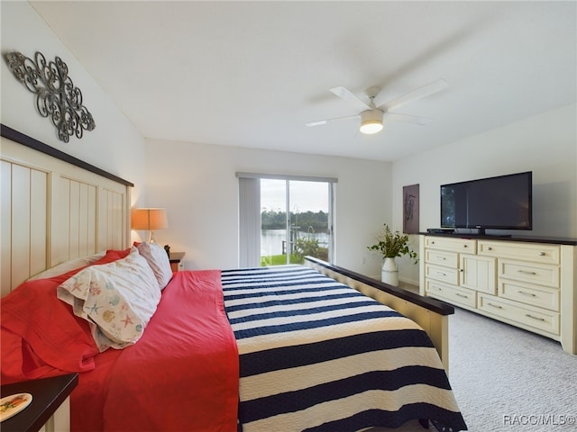 bedroom with light carpet and ceiling fan