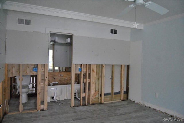 miscellaneous room featuring ceiling fan, ornamental molding, and hardwood / wood-style floors