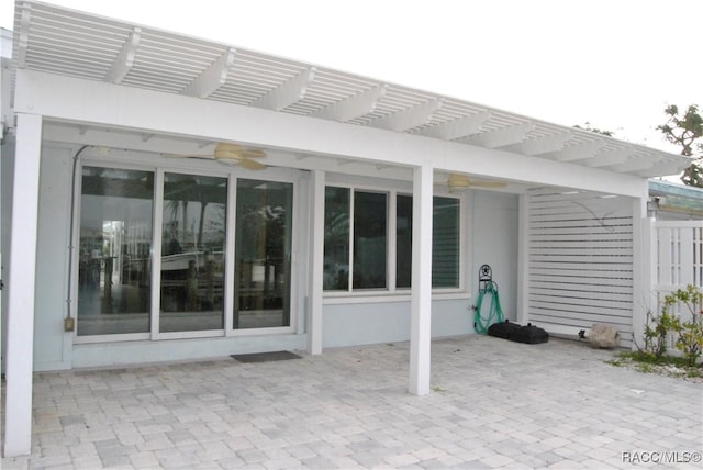 view of patio featuring a pergola