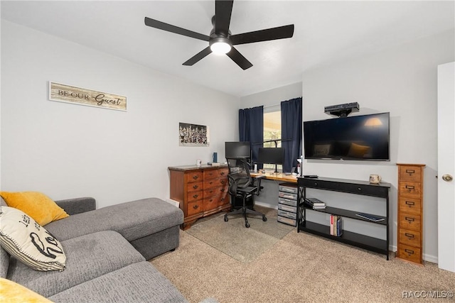 office with carpet flooring and a ceiling fan