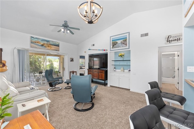 living room featuring light colored carpet, high vaulted ceiling, visible vents, and ceiling fan with notable chandelier