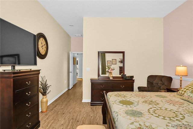 bedroom featuring light hardwood / wood-style flooring