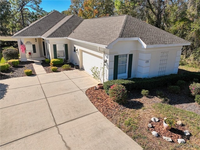 ranch-style house featuring a garage