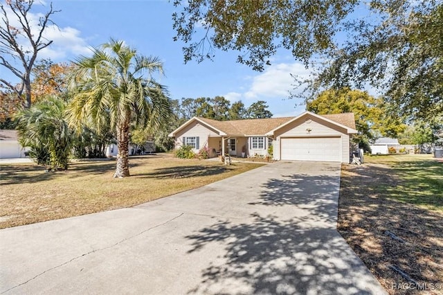 ranch-style home featuring a garage and a front lawn