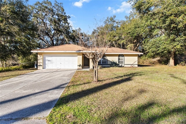 ranch-style house with a garage and a front lawn