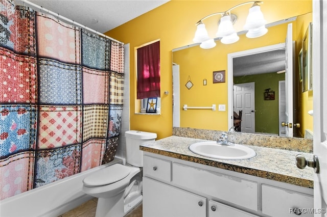 full bathroom with tile patterned flooring, vanity, a notable chandelier, toilet, and shower / bath combo with shower curtain