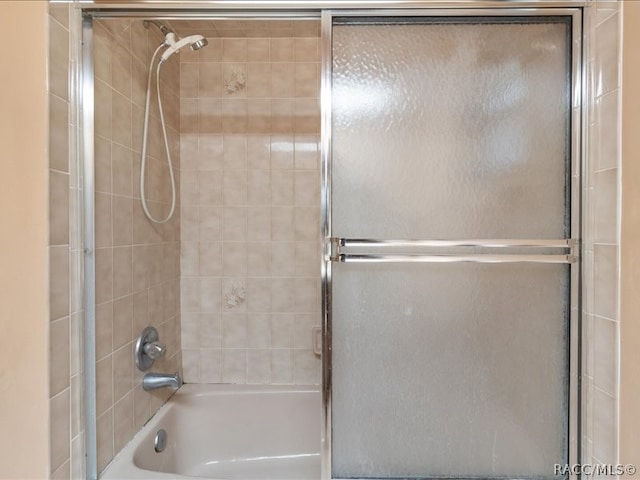 bathroom featuring enclosed tub / shower combo