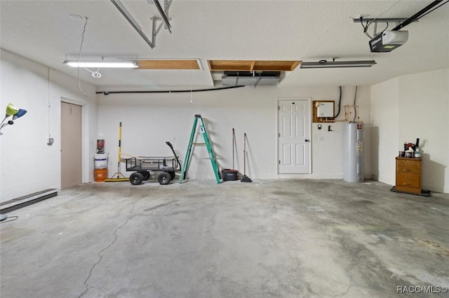 garage featuring a garage door opener and electric water heater