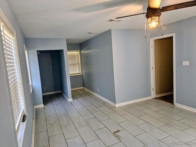 spare room featuring plenty of natural light