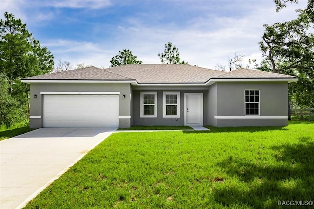 1569 W Mcneal Dr, Citrus Springs, FL 34434 - single story home featuring an attached garage, concrete driveway, a front yard, and stucco siding