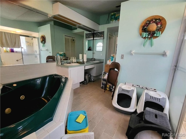 322 N Turkey Pine Loop, Lecanto, FL 34461 - bathroom featuring a whirlpool tub, vanity, and a shower