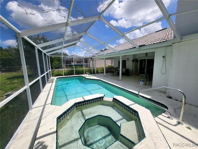 322 N Turkey Pine Loop, Lecanto, FL 34461 - view of swimming pool featuring a patio and a pool with connected hot tub