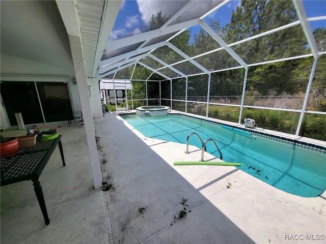 322 N Turkey Pine Loop, Lecanto, FL 34461 - view of pool featuring a patio, a pool with connected hot tub, and a lanai
