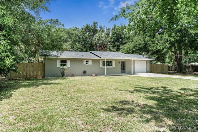 3410 N Bay Ave, Crystal River, FL 34428 - single story home featuring an attached garage, concrete driveway, and stucco siding