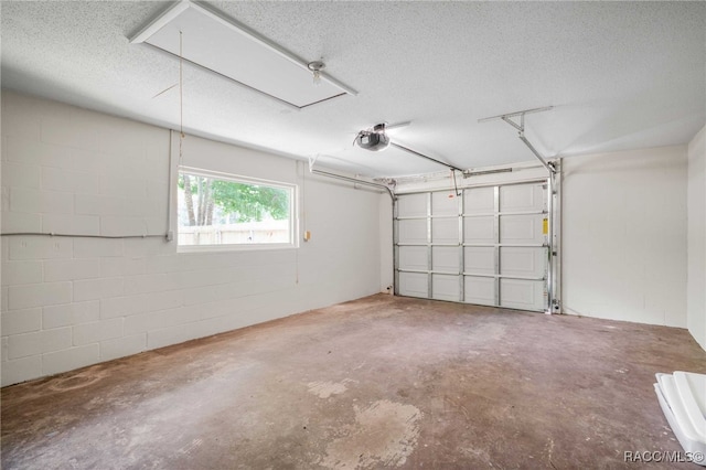3410 N Bay Ave, Crystal River, FL 34428 - garage featuring concrete block wall and a garage door opener