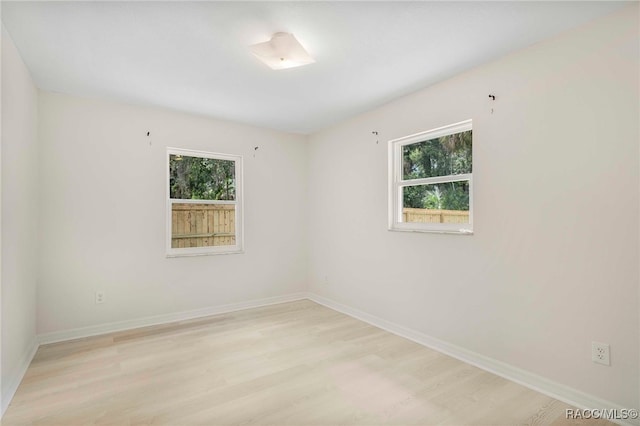 3410 N Bay Ave, Crystal River, FL 34428 - spare room with healthy amount of natural light and light wood-style floors
