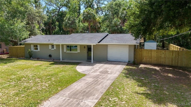 3410 N Bay Ave, Crystal River, FL 34428 - ranch-style house with an attached garage, driveway, stucco siding, and roof with shingles