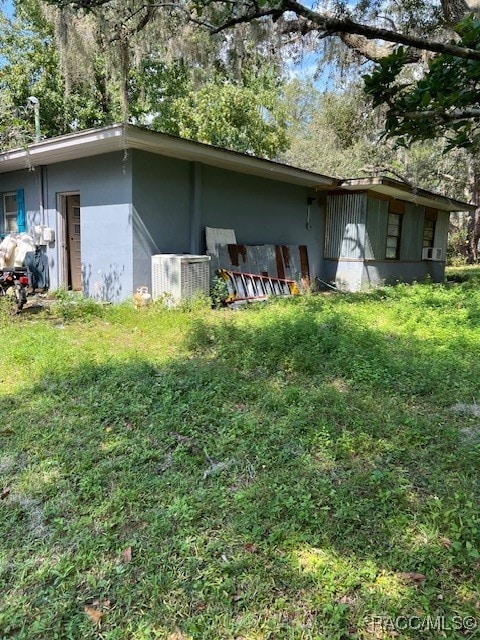 view of property exterior with cooling unit